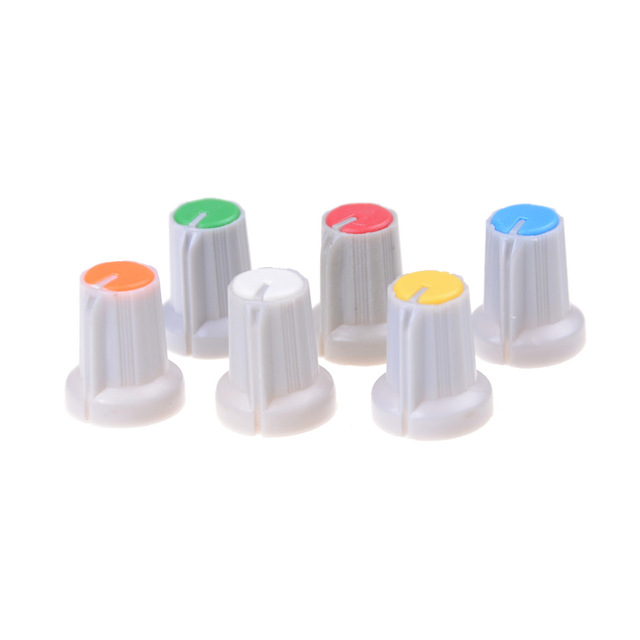 .PER-1030 Perilla plastica de colores para eje ranurado